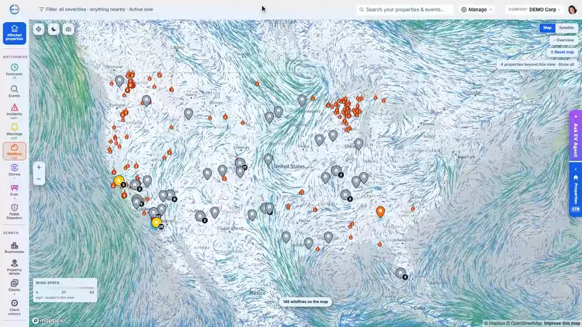 The V-Intel map of the whole country: a company's properties pinned, wind streaming across it and 145 active wildfires